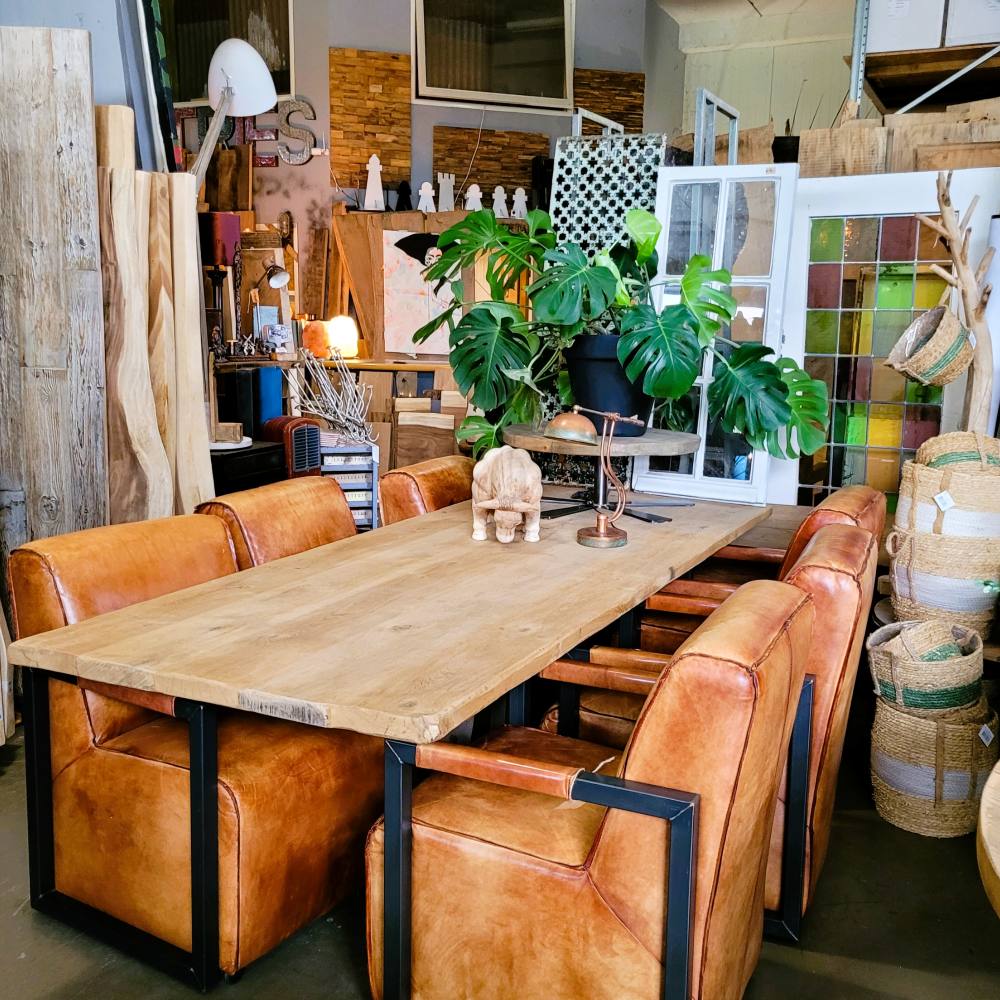 Eetkamerstoel buffelleer cognac met wieltjes